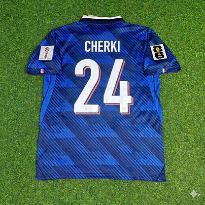 Maillot de football bleu domicile de la France Coupe du Monde 2026 Rayan Cherki 24