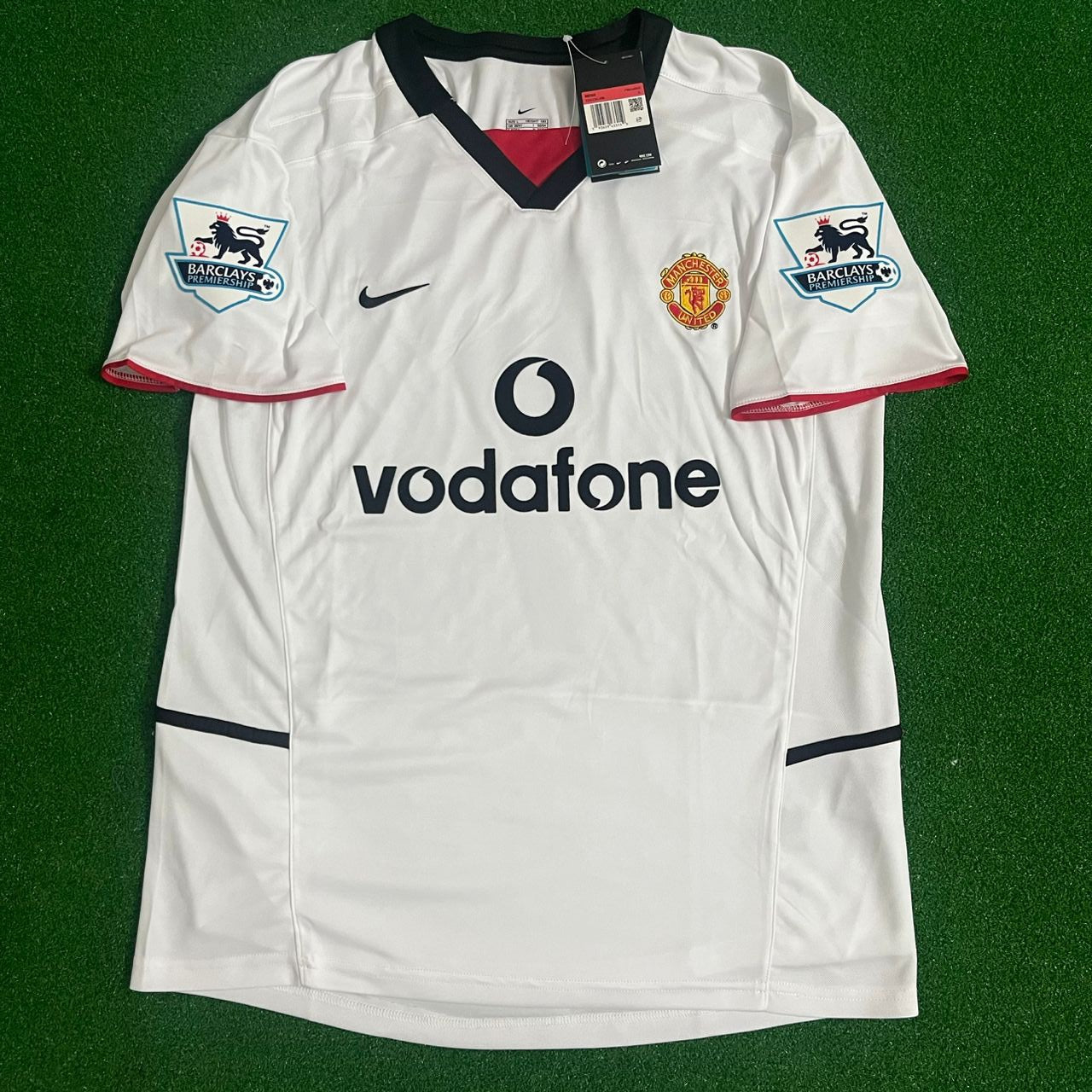Maillot Manchester United moderne signé par David Beckham et encadré Maillot Manchester United moderne signé par David Beckham et encadré