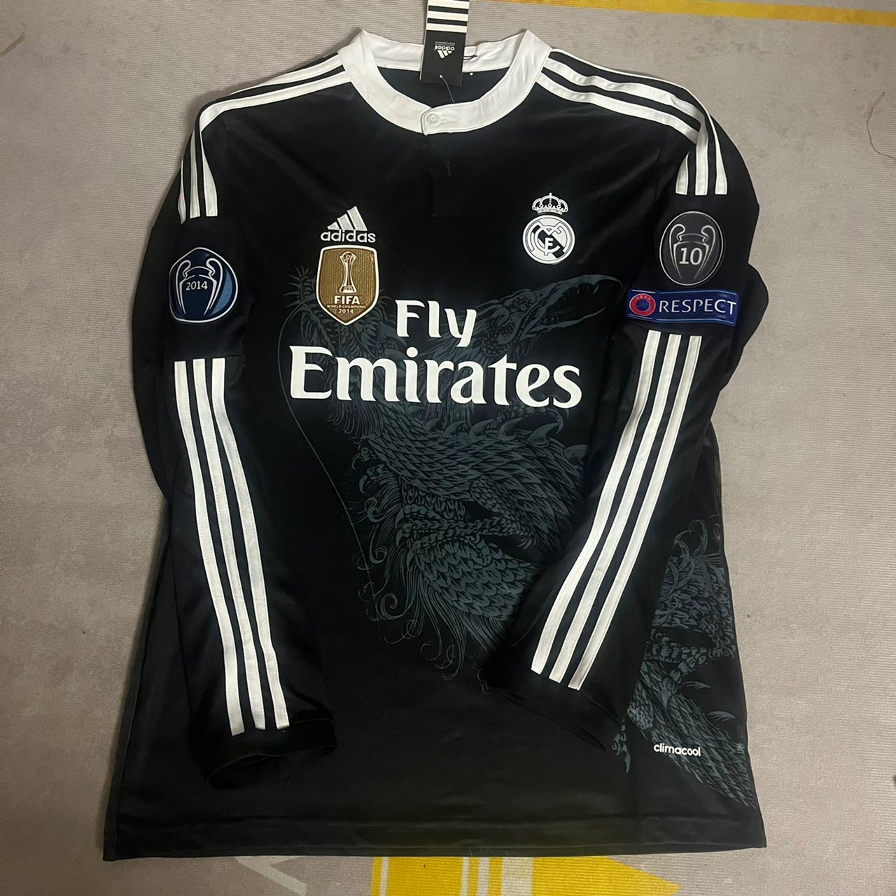 Real madrid black long sleeve jersey on sale